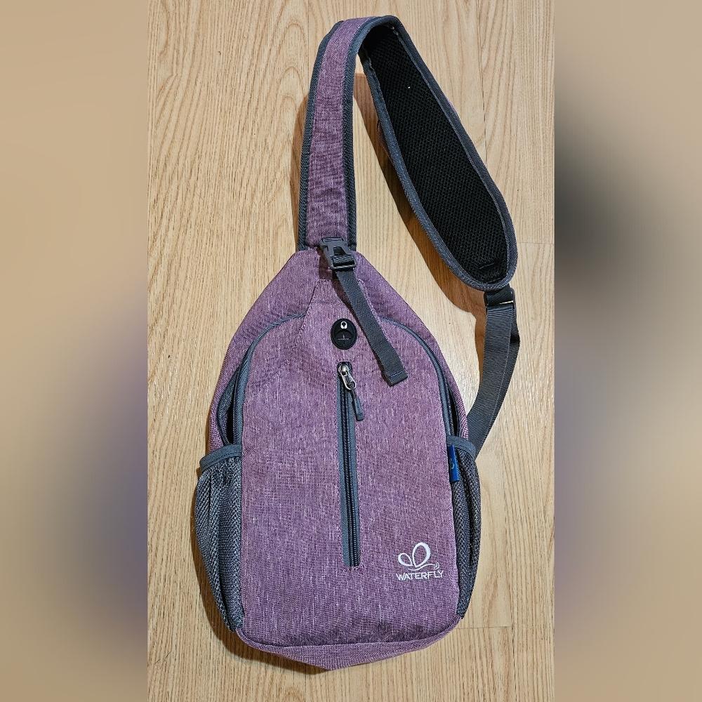 WATERFLY Sling Bag Crossbody Women Backpack Purple previously owned Condition